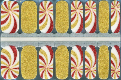 Candy cane nail wraps sheet featuring gold glitter and red white swirl patterns for Christmas manicure