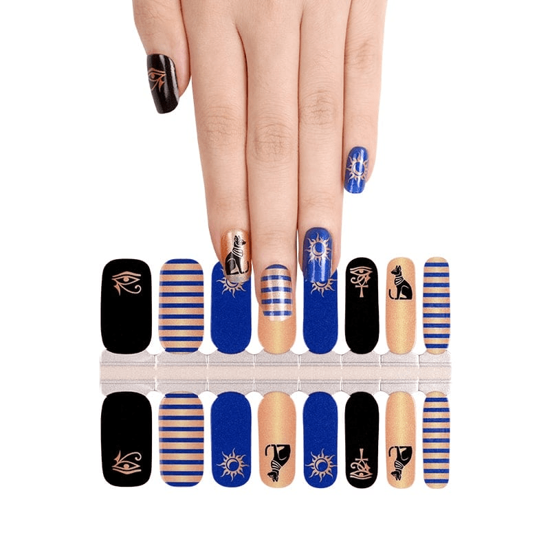 Egyptian themed nail wraps in blue black nude with cat hieroglyphic striped patterns