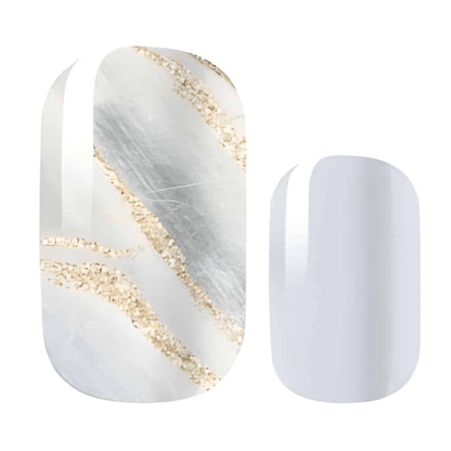 Nail wraps in white-grey marble with gold glitter veins, paired with solid pale grey