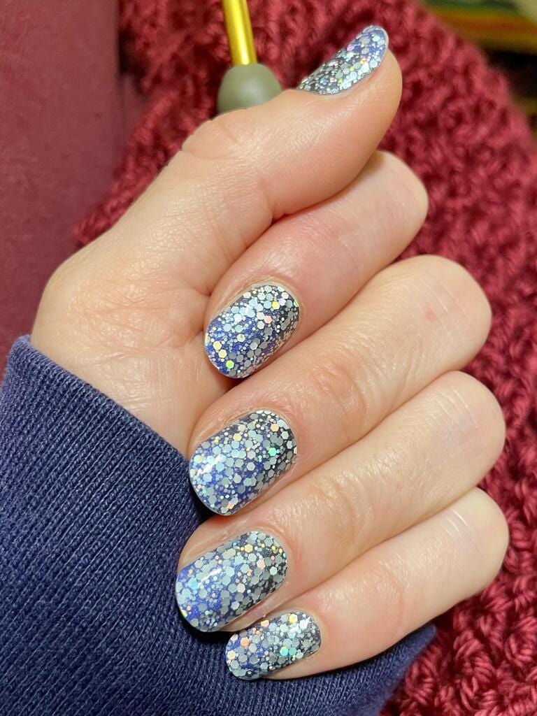 Silver and blue chunky glitter nail wraps with holographic sparkle on short round nails