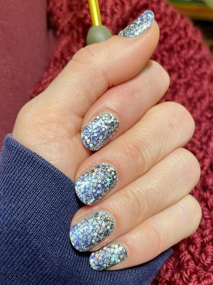 Silver and blue chunky glitter nail wraps with holographic sparkle on short round nails