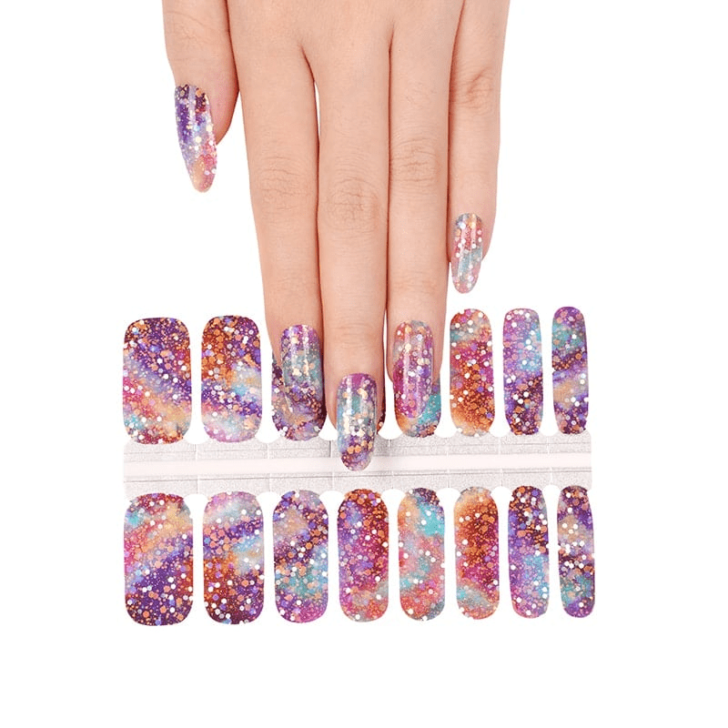 Holy Classics nail wraps in multicolour galaxy glitter with purple, pink and teal tones