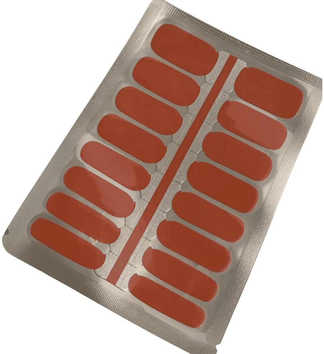 Coral orange nail wraps sheet showing individual strips for at-home manicure