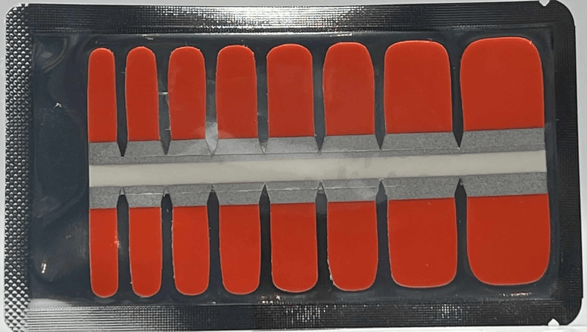 Coral orange pedicure nail wraps sheet with multiple toenail sizes for DIY manicure