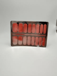 Colour-changing nail wrap collection in coral pink shades with clear accent strips