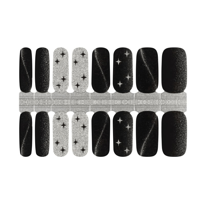Black and silver glitter nail wraps with star patterns and lightning bolt designs