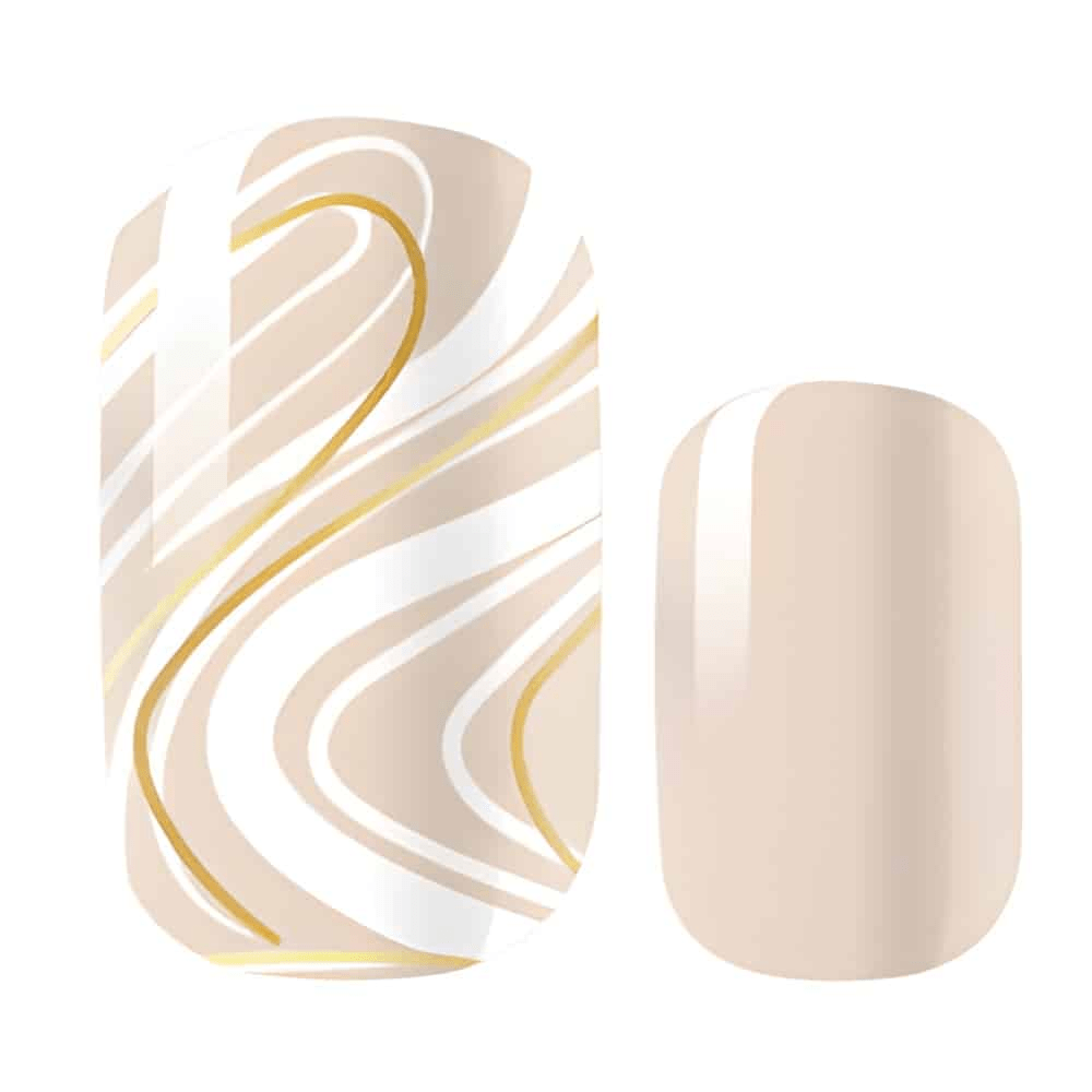 Close-up cream marble nail wrap design with gold accent swirls