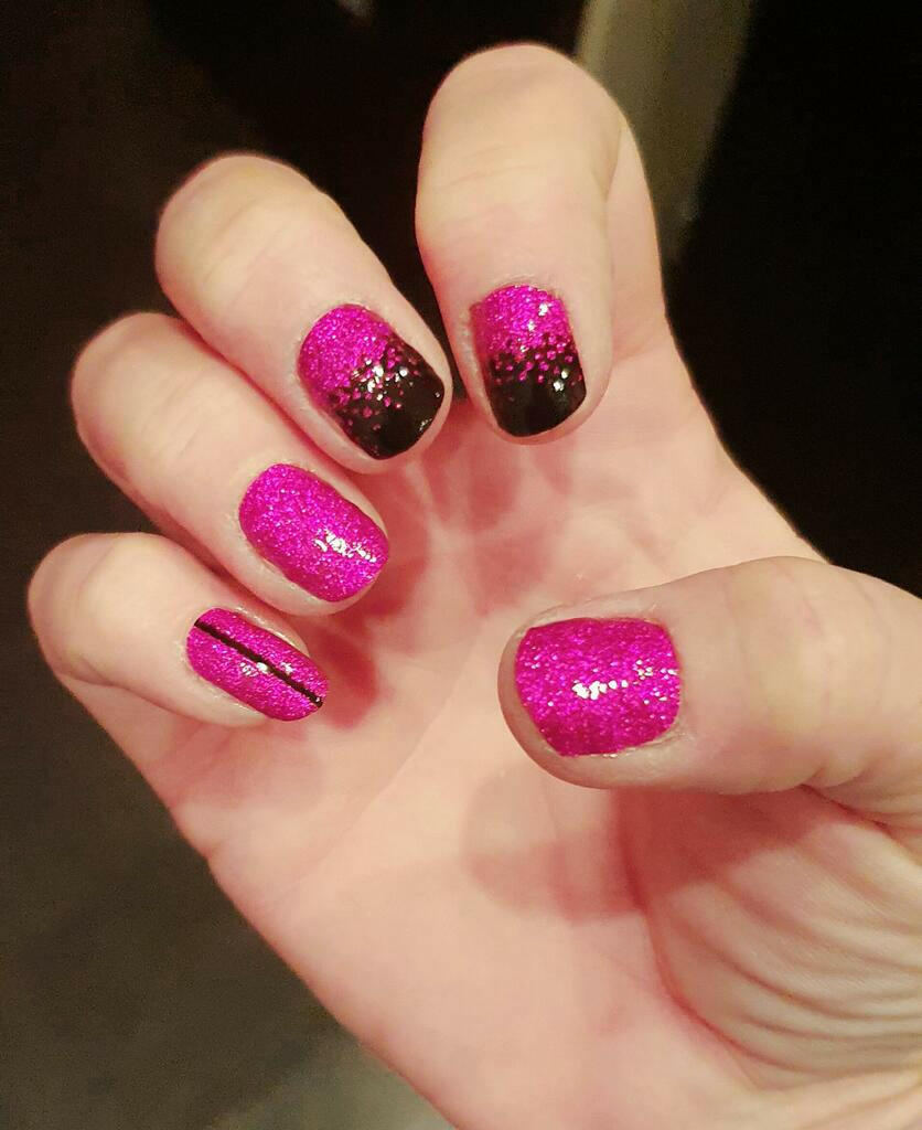 Hot pink glitter nail wraps with black accent nails and ombré glitter fade