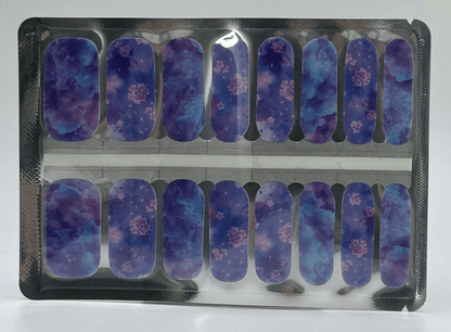 Holy Classics nail wraps, purple-blue tie-dye with pink floral clusters, glossy finish
