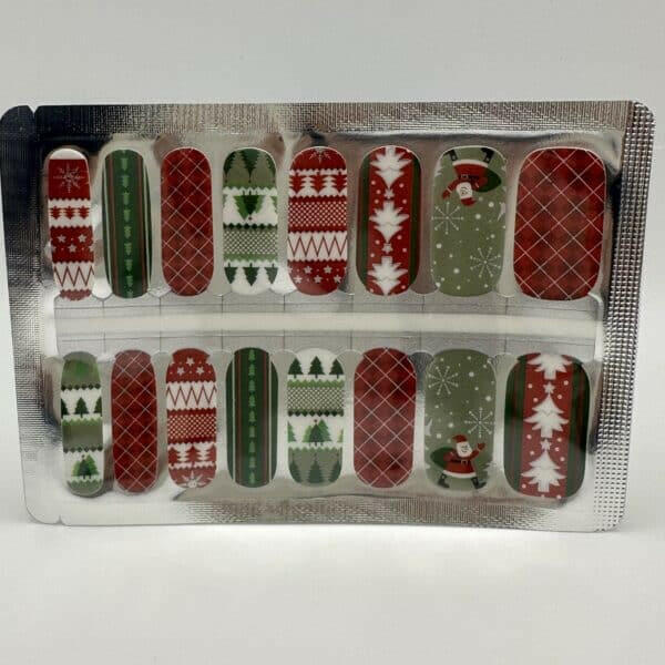 Christmas nail wraps sheet featuring red and green holiday patterns with Fair Isle designs