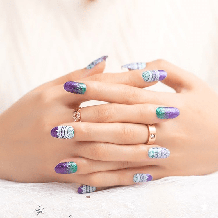 Purple-to-teal shimmer nail wraps with white lace-pattern accent tips