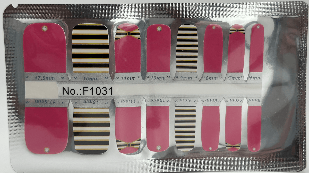 Pink and black striped pedicure nail wrap sheet with alternating pattern designs