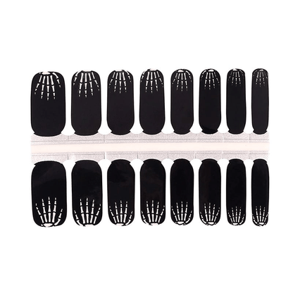 Complete set of black skeleton bone pattern nail wraps for spooky Halloween manicure