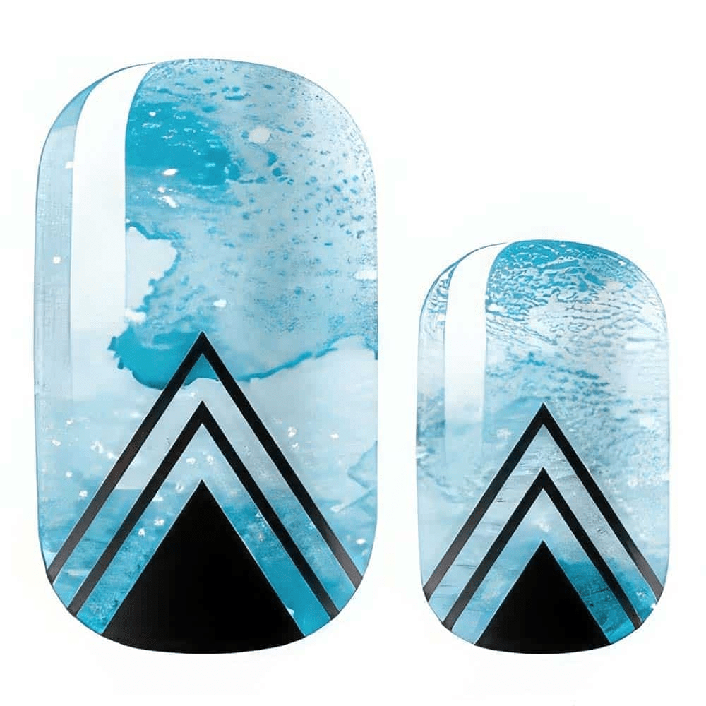 Close-up blue marble nail wraps with black geometric chevron design and sparkle texture