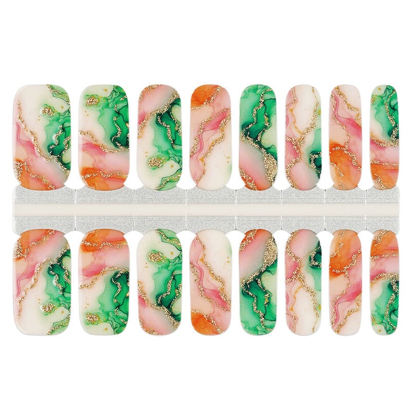 Green orange marble nail wraps with gold foil details in packaging sheet