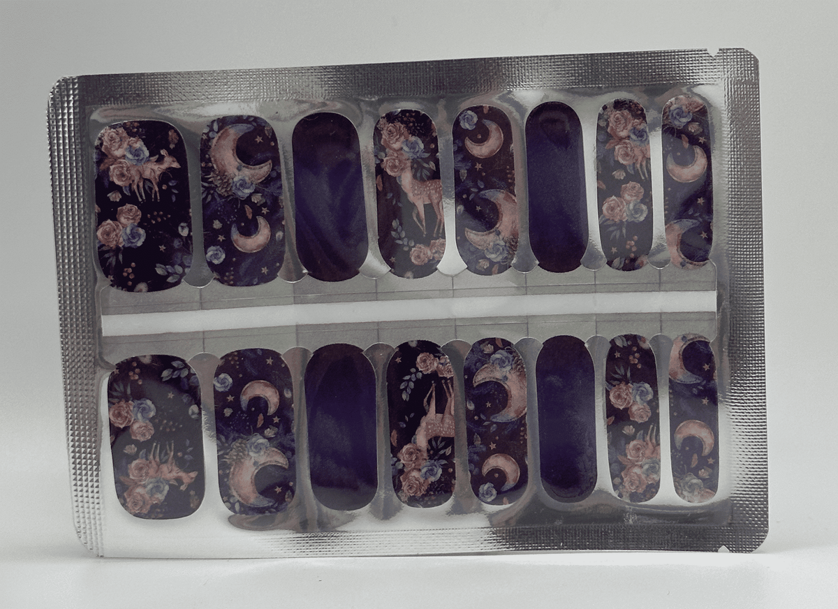 Purple botanical nail wraps with mystical forest deer and floral designs