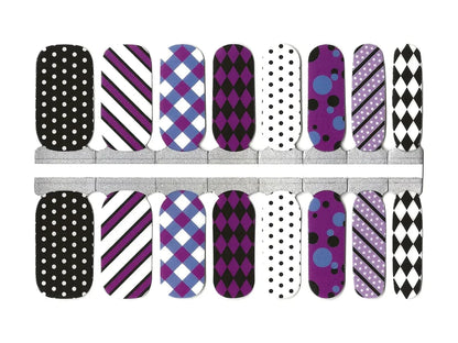 Complete nail wrap sheet showing purple, black and white geometric patterns including dots and stripes