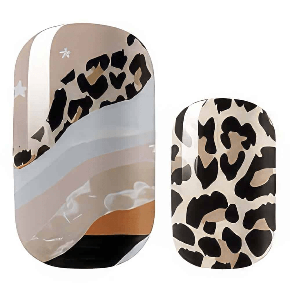 Leopard print nail wraps with brown and cream spots on neutral matte background