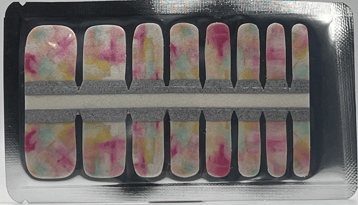 Pink watercolour pedicure nail wraps in packaging showing abstract pastel ombre patterns