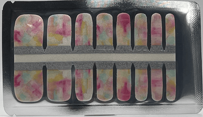 Pink watercolour pedicure nail wraps in packaging showing abstract pastel ombre patterns
