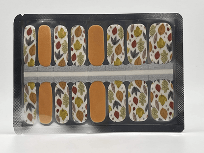 Non-UV nail wraps sheet featuring autumn leaves pattern in orange and yellow tones