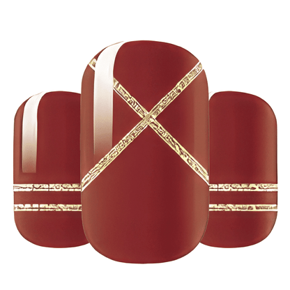 Deep red nail wraps with metallic gold crosshatch pattern for elegant at-home manicure