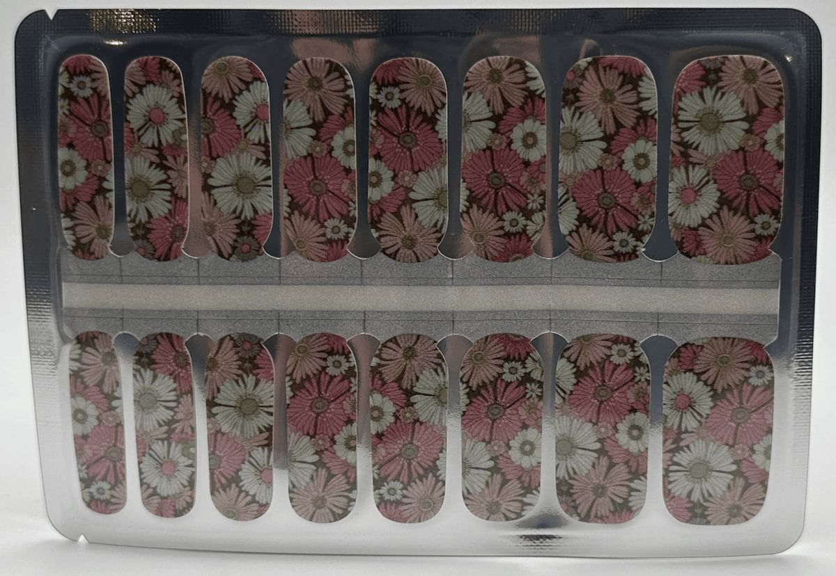 Vintage floral nail wraps sheet showing pink pressed flower design for at-home manicure
