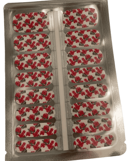 Sheet of pink floral nail wraps showing individual strips with hibiscus flower pattern