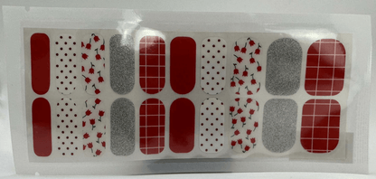 Wide fit nail wrap sheet with red, silver glitter and floral patterns for at-home manicure