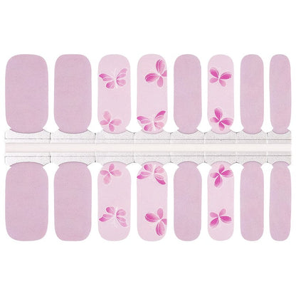 Lilac nail wraps with pink butterfly accents, matte finish