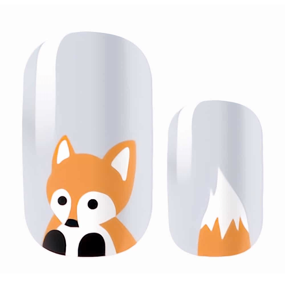 Fox nail wraps close-up showing adorable orange fox character design on grey background