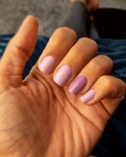 Matte lilac purple nail wraps on short round nails, solid colour finish