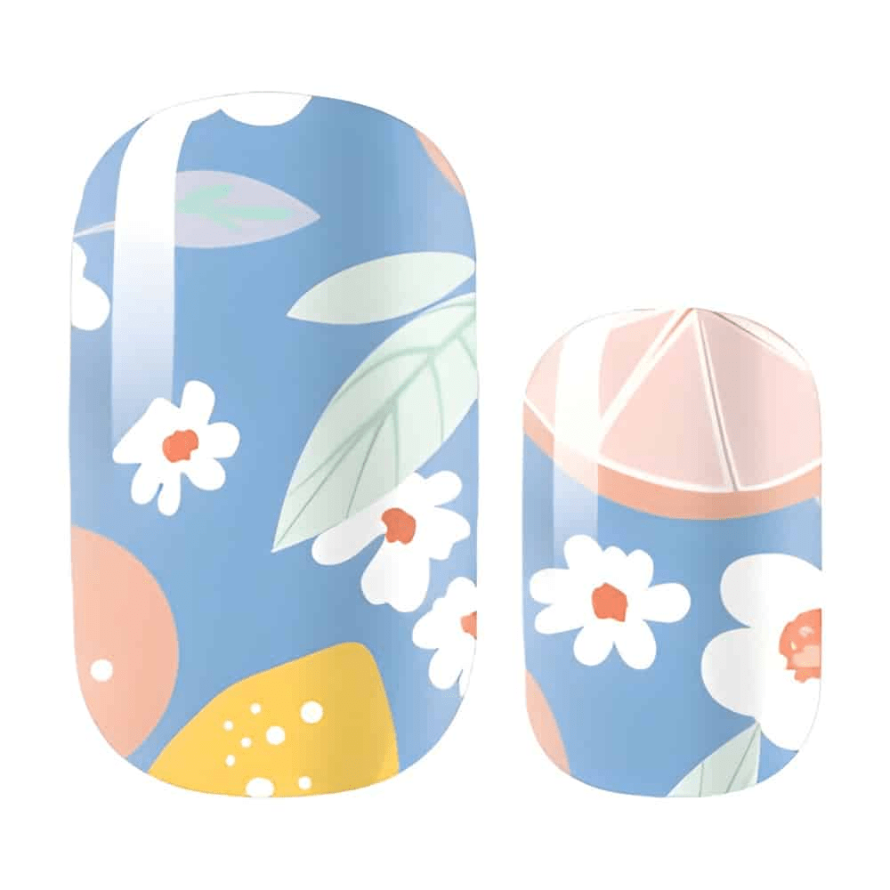 Blue fruit cocktail nail wrap design with white daisies and citrus pattern for summer manicure