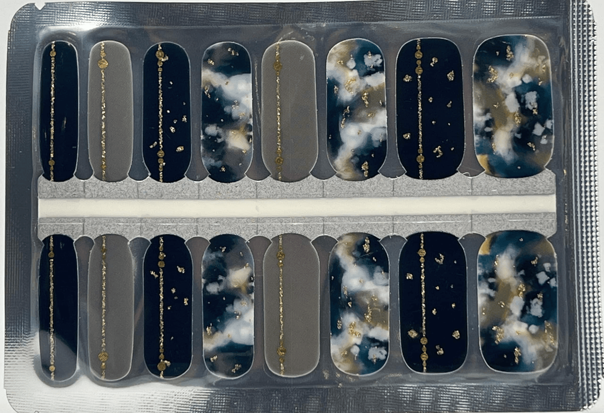 Non-UV nail wraps sheet showing marble pattern with gold accents in various sizes