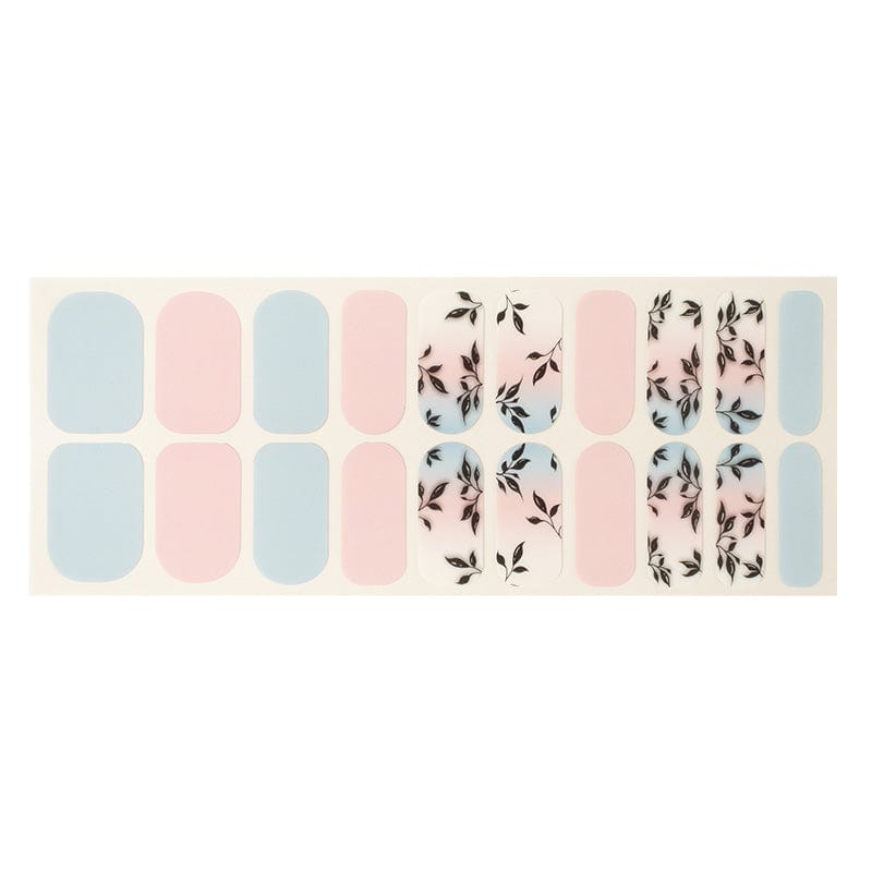 Nail wraps in soft pink and blue with black leafy branch accents, wide fit sheet