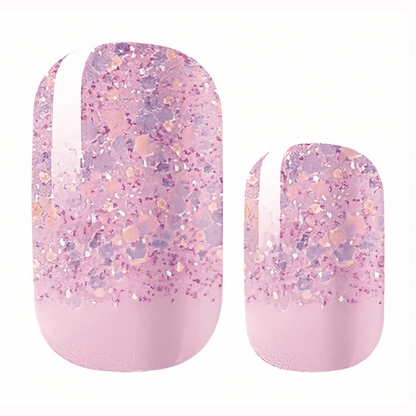 Pink glitter gradient nail wraps with rose gold sparkles for glamorous at-home manicures