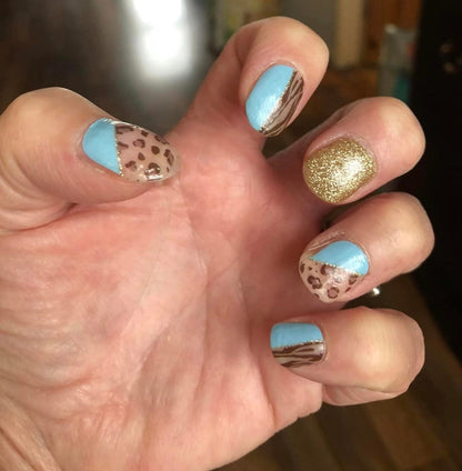 Holy Classics nail wraps, blue tips with leopard and zebra print, gold glitter accent nail