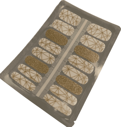 Gold geometric non-UV nail wraps with metallic glitter and white patterns on sheet