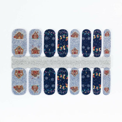 Festive Christmas nail wraps with gingerbread men, snowflakes and navy blue holiday patterns