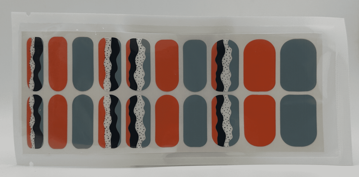 Wide fit nail wraps sheet featuring retro geometric patterns in orange blue black colours