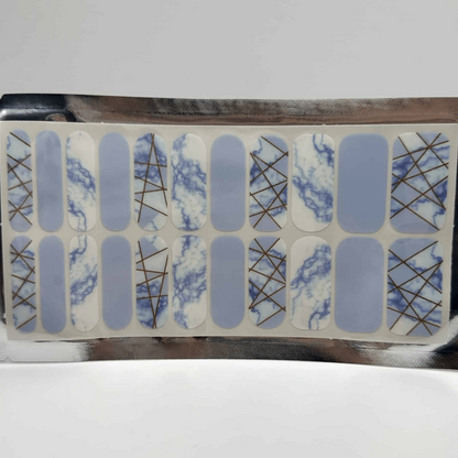Blue marble nail wraps sheet showing geometric patterns and stone effect designs