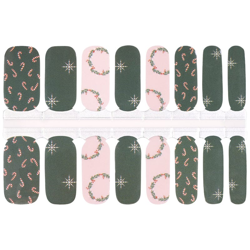 Non-UV Christmas nail wraps sheet featuring green and pink holly snowflake patterns