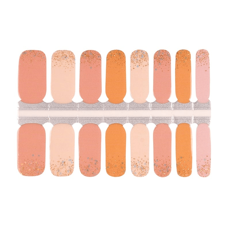 Orange gradient nail wraps with gold glitter ombre finish in warm autumn tones