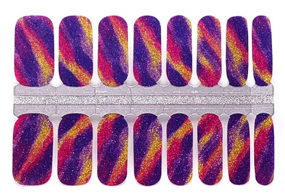 Purple gold glitter gradient nail wraps with diagonal ombre design for statement manicure