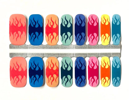 Multicolour nail wraps with bold flame graphics in contrasting matte shades per nail.