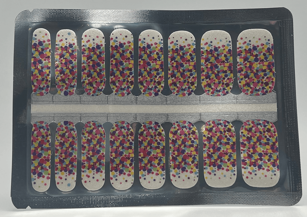 Complete sheet of confetti polka dot nail wraps with multicoloured circles pattern