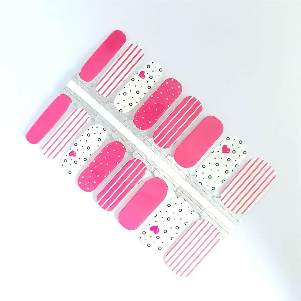 Pink striped nail wraps with heart polka dots pattern for Valentine's manicure, multiple designs