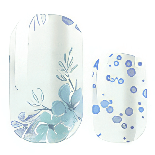 Blue floral nail wraps with delicate botanical pattern and shimmer finish