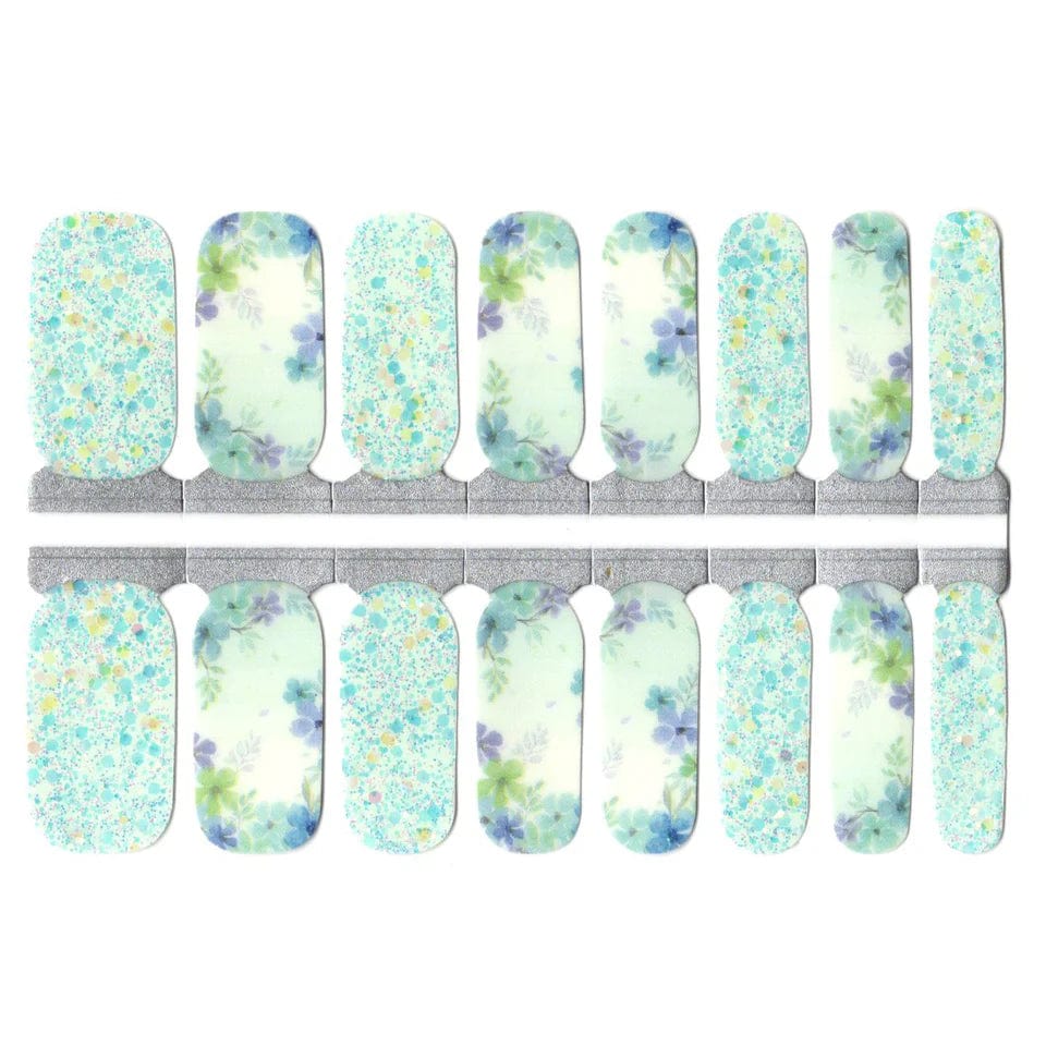 Non-UV nail wraps sheet showing blue floral glitter design for at-home manicure