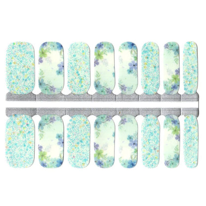 Non-UV nail wraps sheet showing blue floral glitter design for at-home manicure